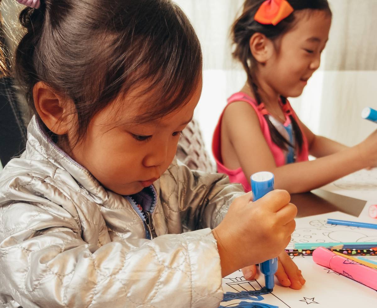 Two sisters colouring