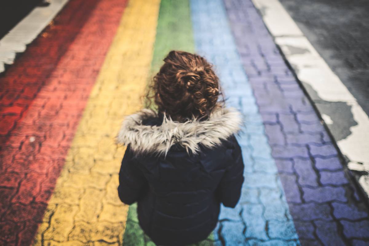 Child facing the coloured road