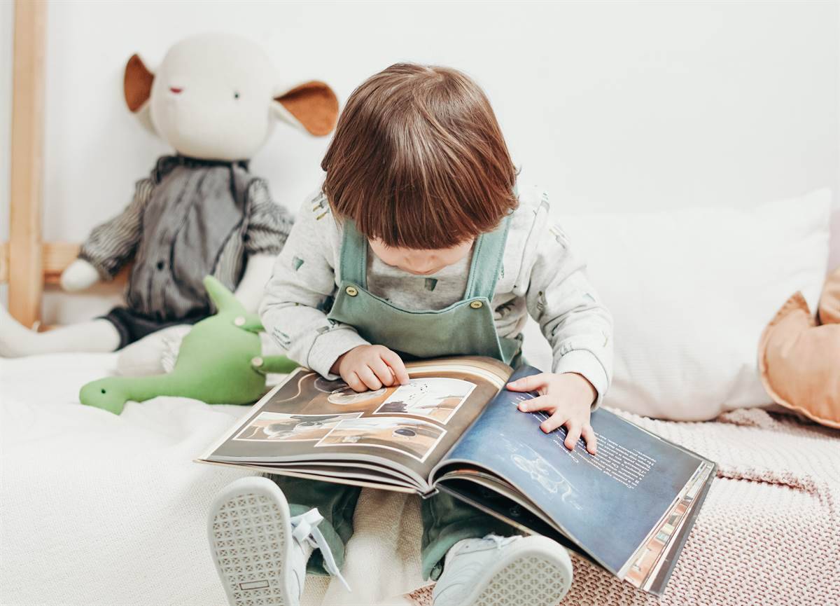 A child looking at a book
