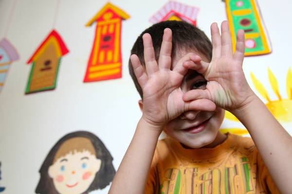 Boy (4 years) in a playroom at Children’s Development Center (nightcare) for children coming from disadvantaged families or abandoned children.