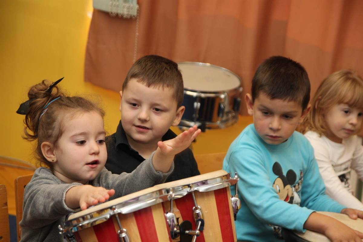 Girl playing drums.