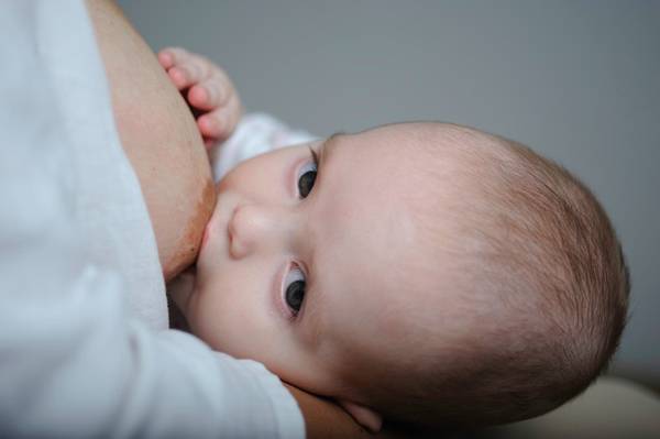 Mother breastfeeding her baby (Montenegro).