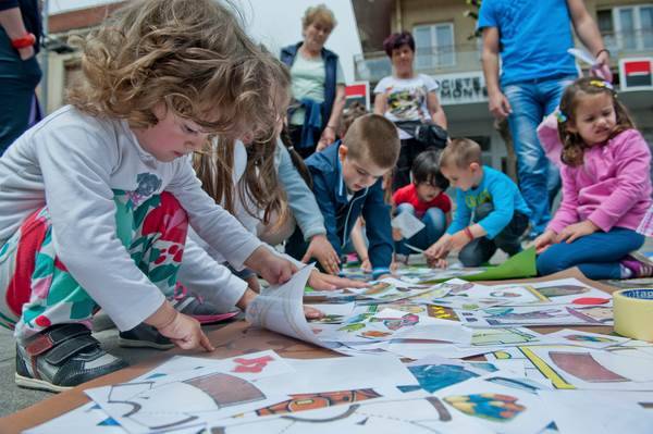 3-5 year old children are captured while playing in an outdoor kindergarten in Montenegro.