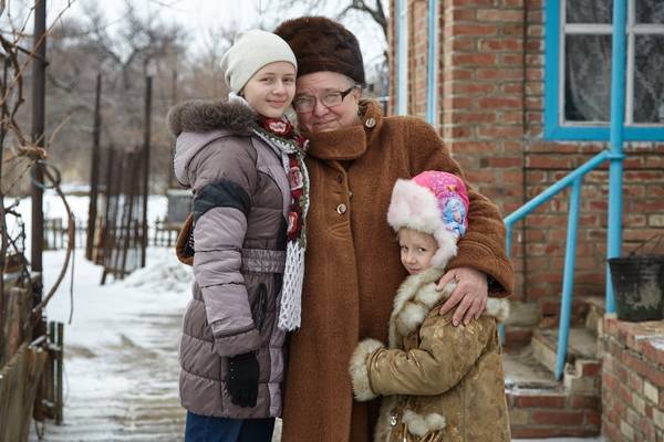 Kids spending time with her grandmother.