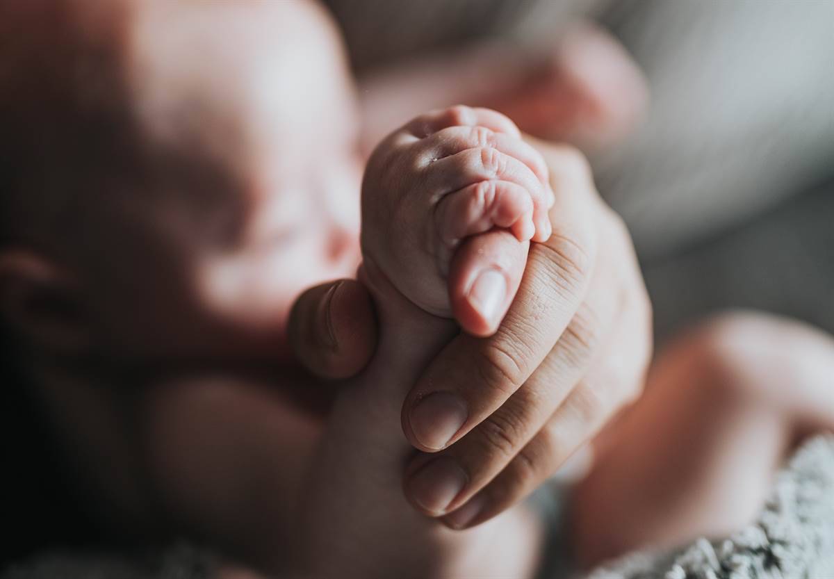 Father with daughter holding hands