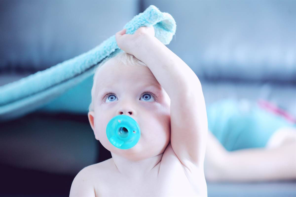 Baby (1 y.o) at home playing