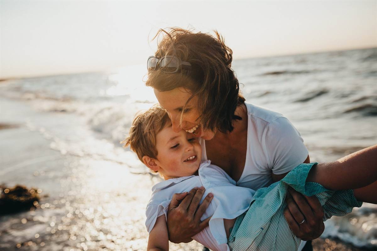 Mother with her son outside