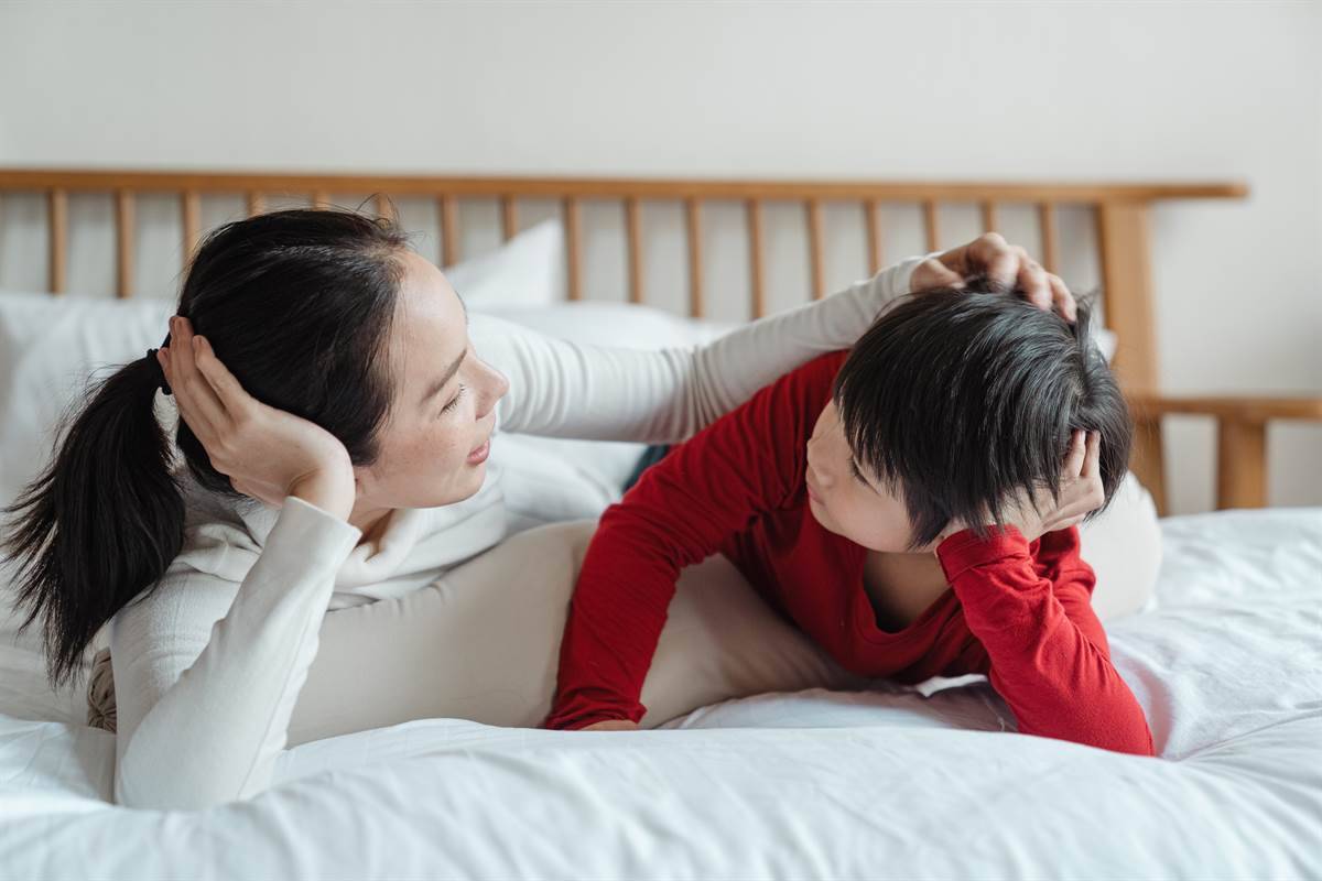A mother talking to her child