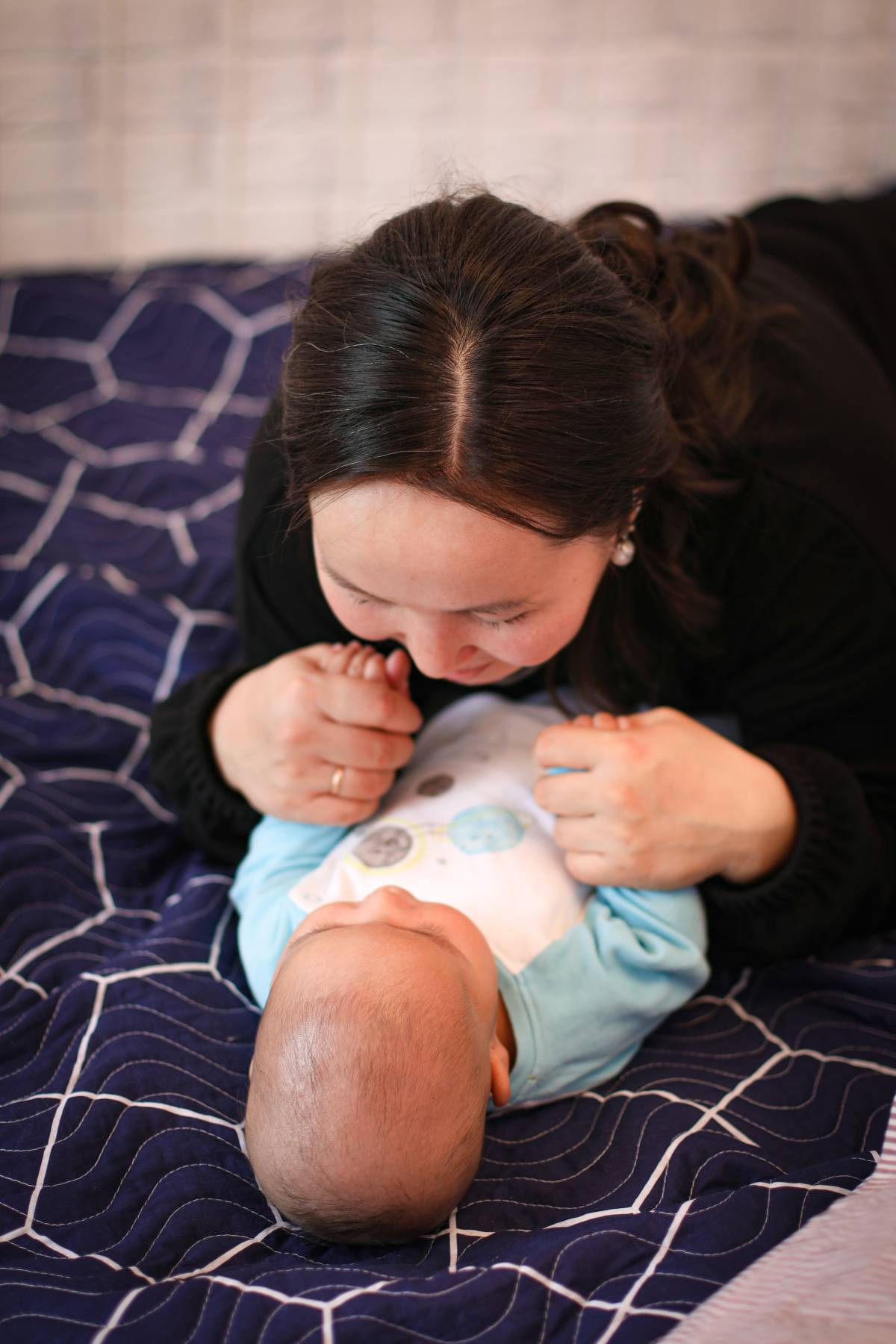 Playing with new born baby