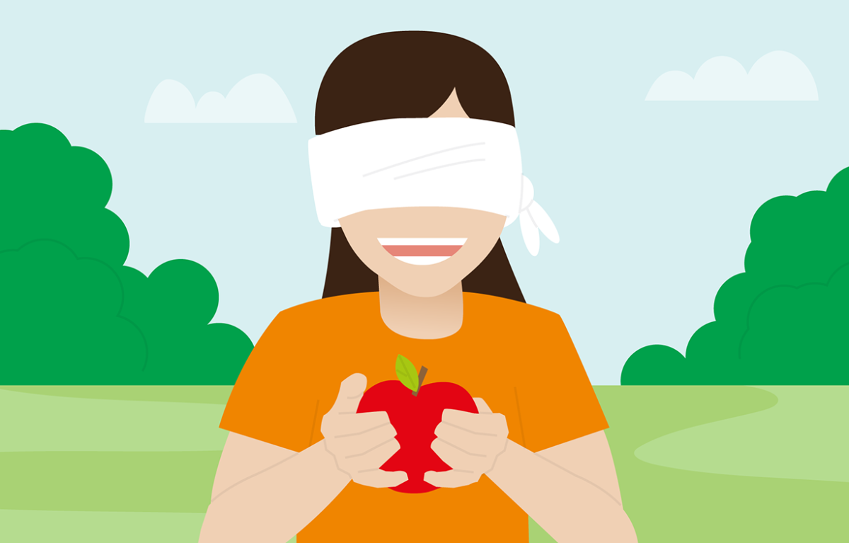 cartoon girl blindfolded holding an apple