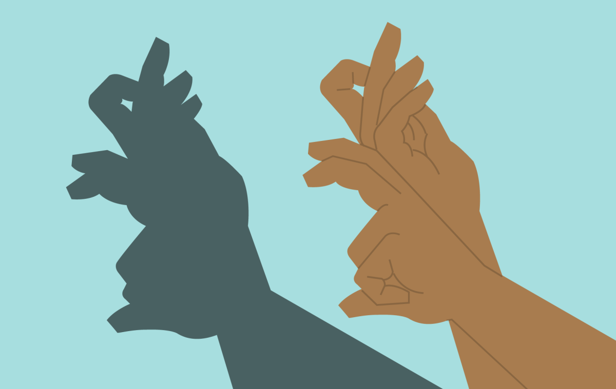 cartoon hands, making shapes to create a shadow figure