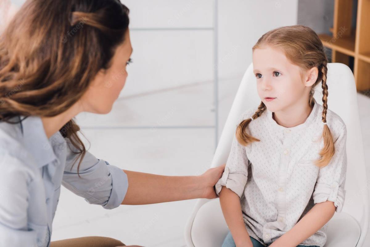Adult talking to child