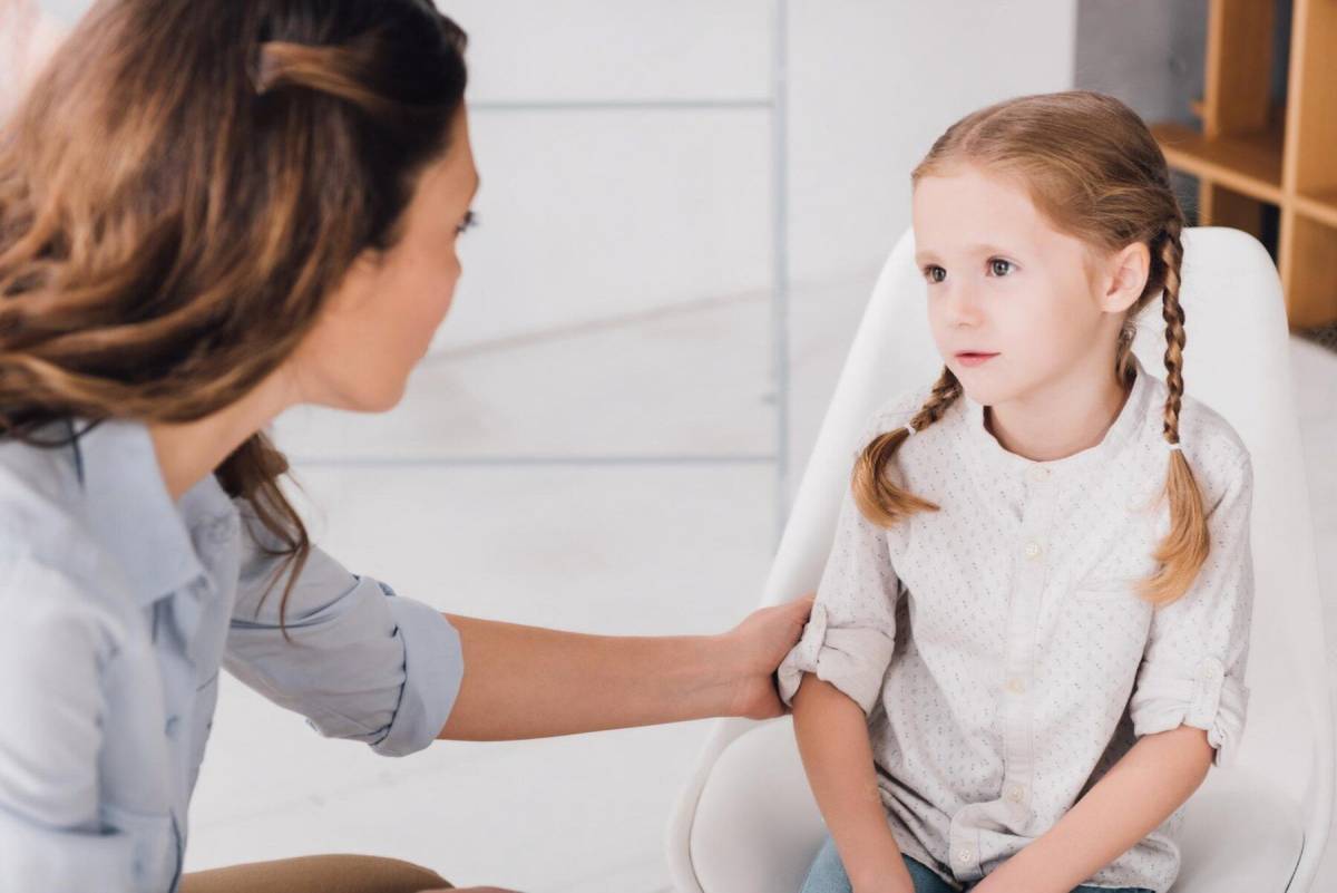 Adult talking with child