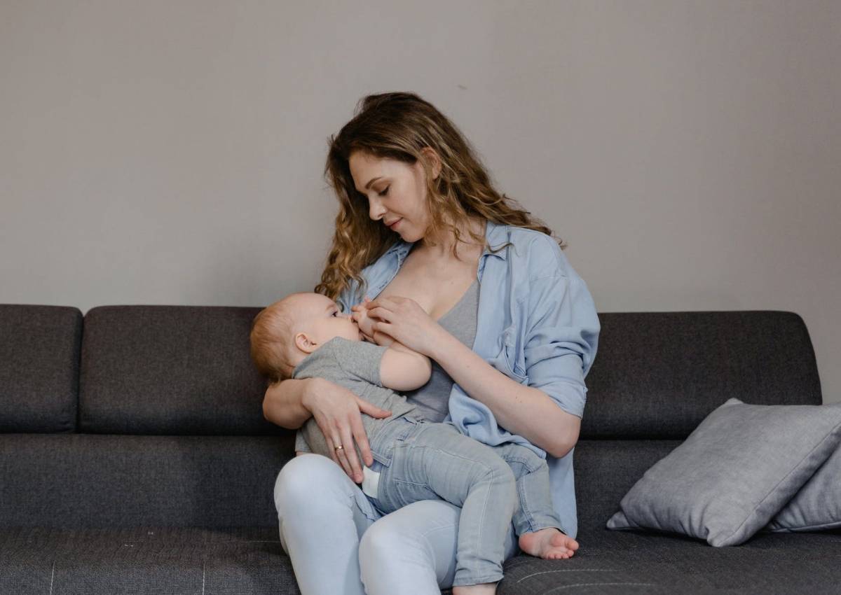 Woman breastfeeding child