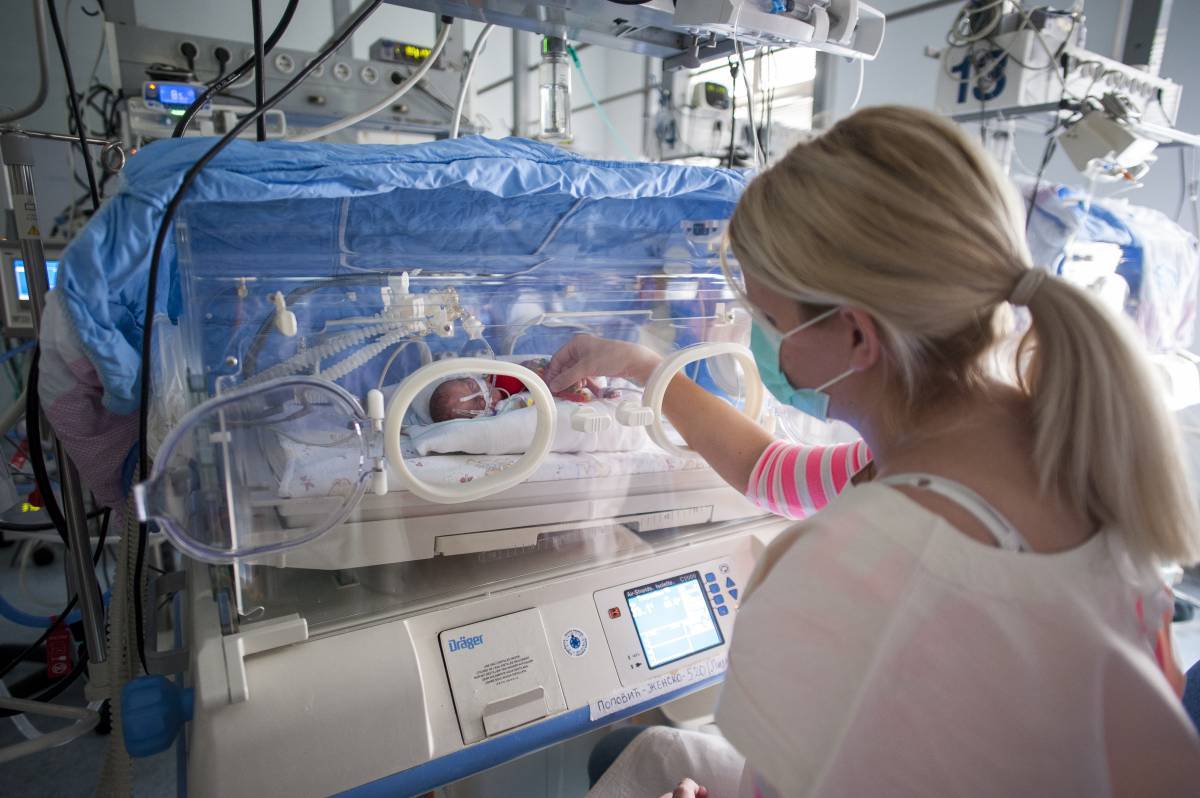 Mother and baby in NICU