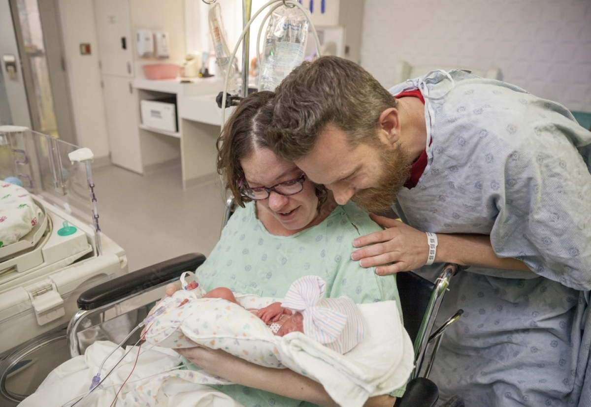 Parents with baby in NICU