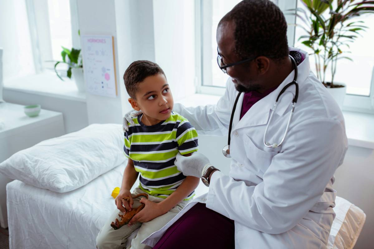 Sick child visiting doctor