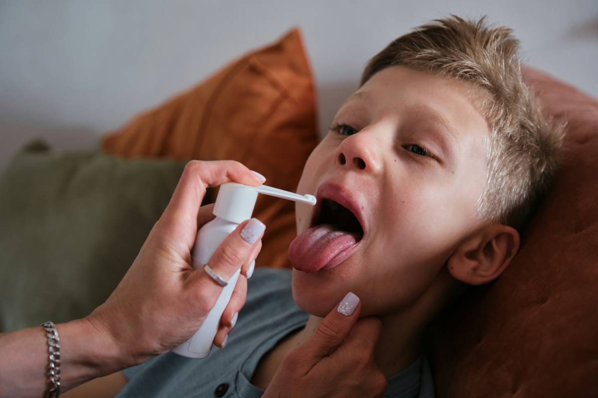 Boy with sore throat