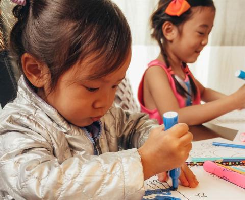 Two sisters colouring