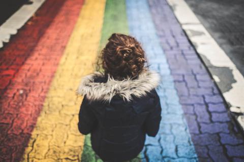 Child facing the coloured road