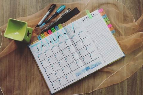 A weekly planner with stickers