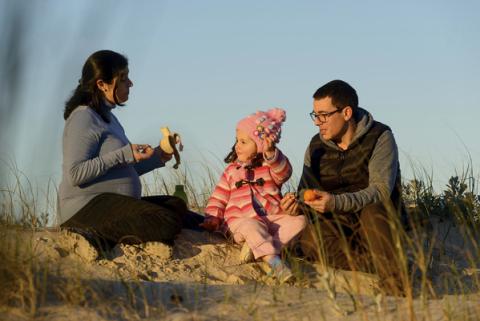 Family sharing time outside.