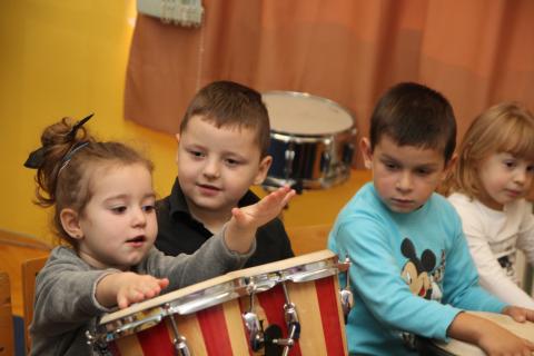 Girl playing drums.