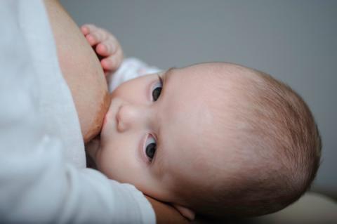 Mother breastfeeding her baby (Montenegro).