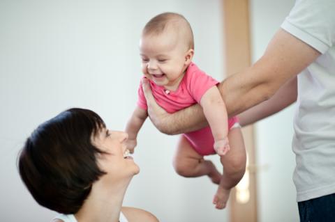 Parents playing with Baby (Bosnia and Herzegovina).
