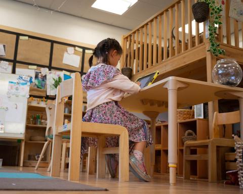 child reading at home online