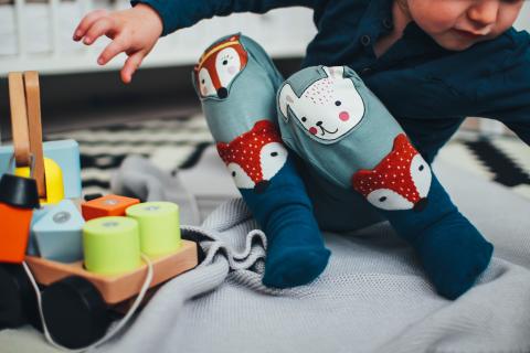 A toddler playing at home