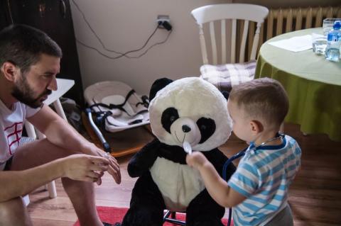 Father playing with his son