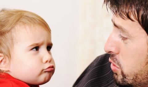 A father chatting with his daughter