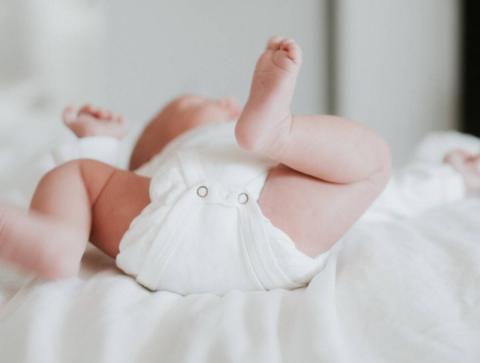A baby in a diaper