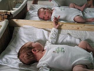 A child facing her/himslef in the mirror