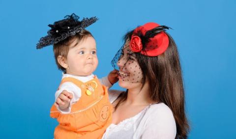 A mother and a child wearing hats
