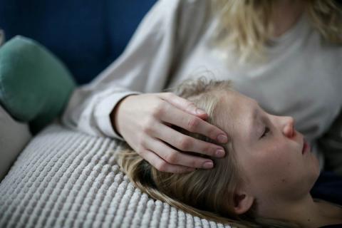 A child showing fatigue