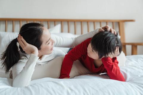 A mother talking to her child