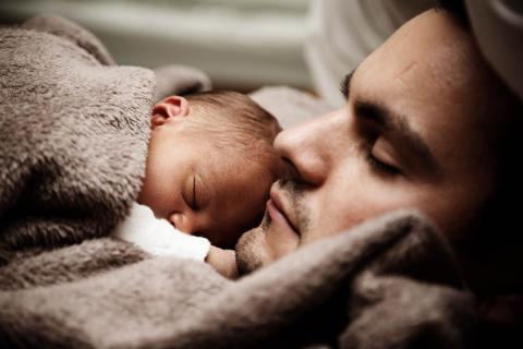 A father sleeping with his child 