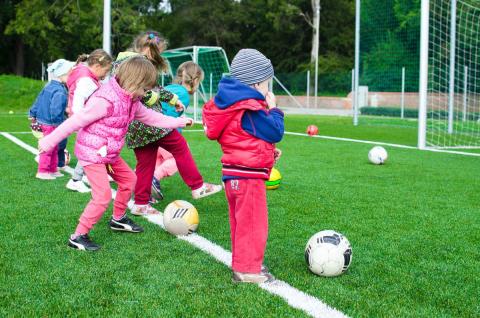girls playing football