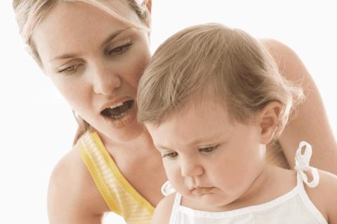mother telling her baby a story