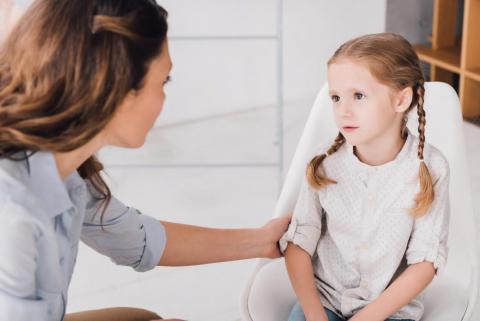 Adult talking with child