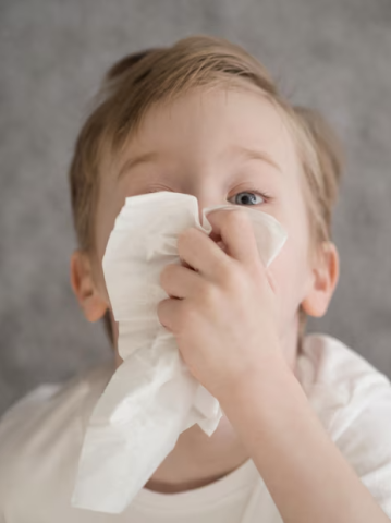 Child with nosebleed