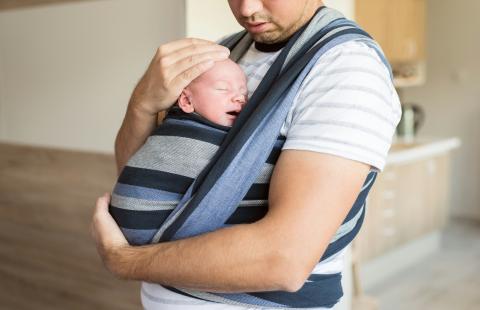 Man holding baby