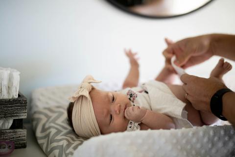 Changing baby's diaper