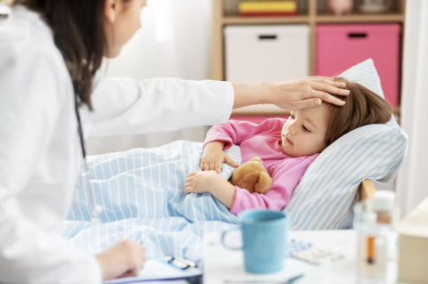 Sick toddler visiting doctor