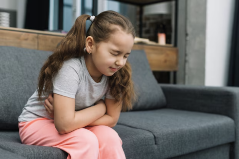 Girl with upset stomach