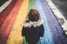 Child facing the coloured road