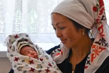 Mother and her newborn baby.